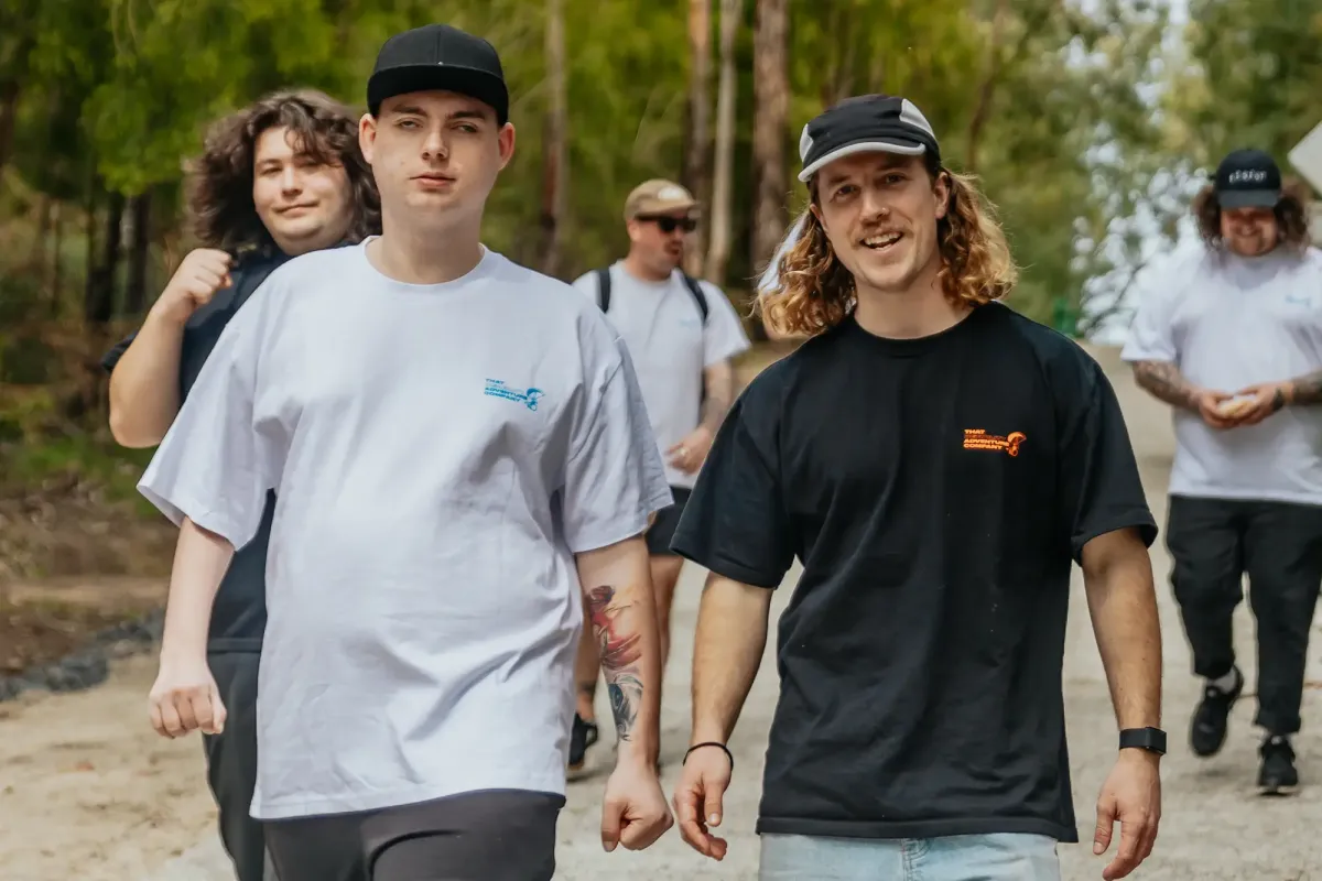 TDAC team walking through a forest trail – inclusive adventure